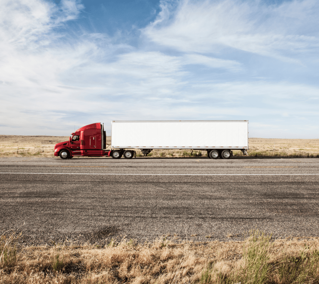 transport truck driving with a full load to their destination