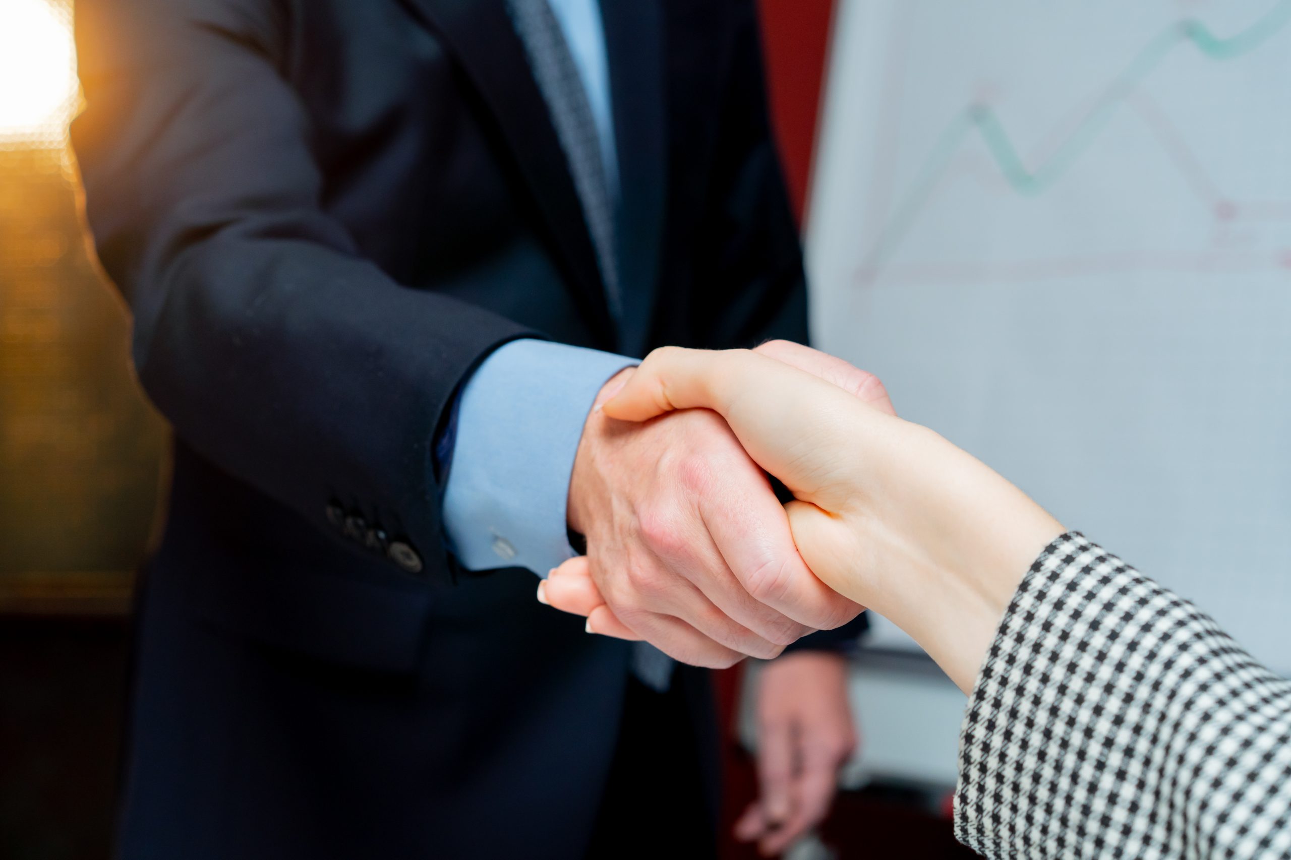 a handshake between the boss and the employee