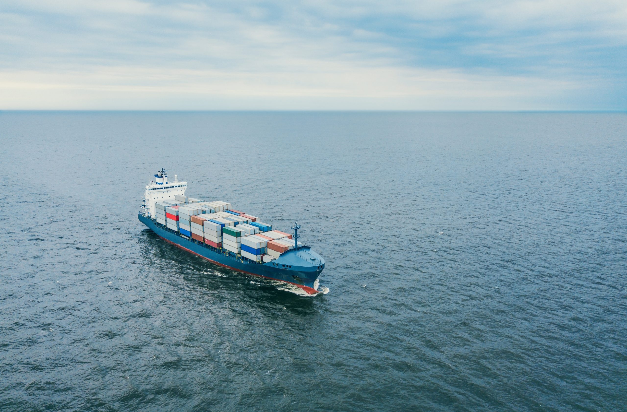 Container vessel sailing in open sea